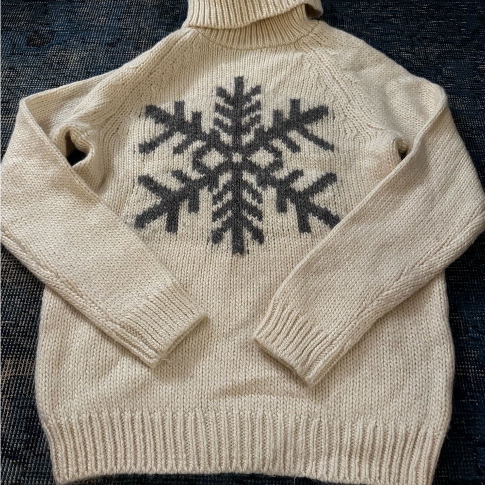 Cozy Cream Turtleneck Alpaca Sweater with Gray Snowflake Design